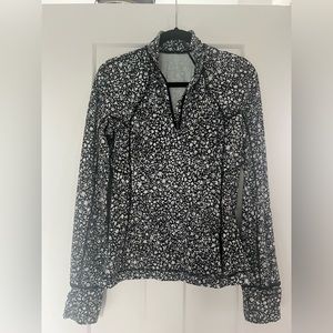 Lululemon It’s Rulu Run half zip in Venture Floral Alpine White and Black